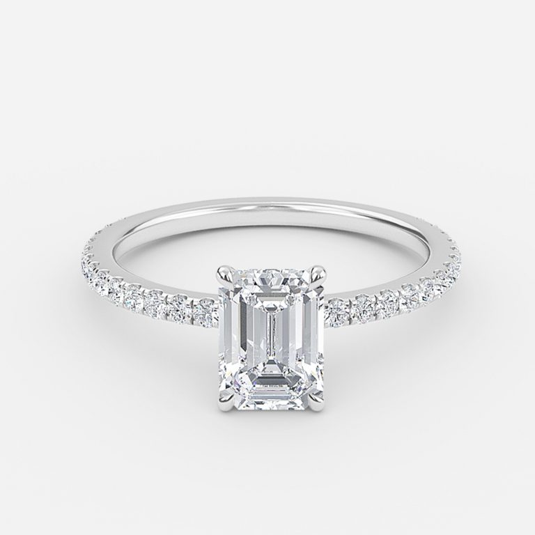 dainty emerald cut engagement ring