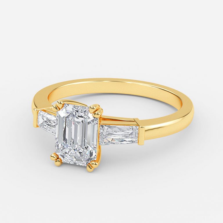 emerald three stone ring