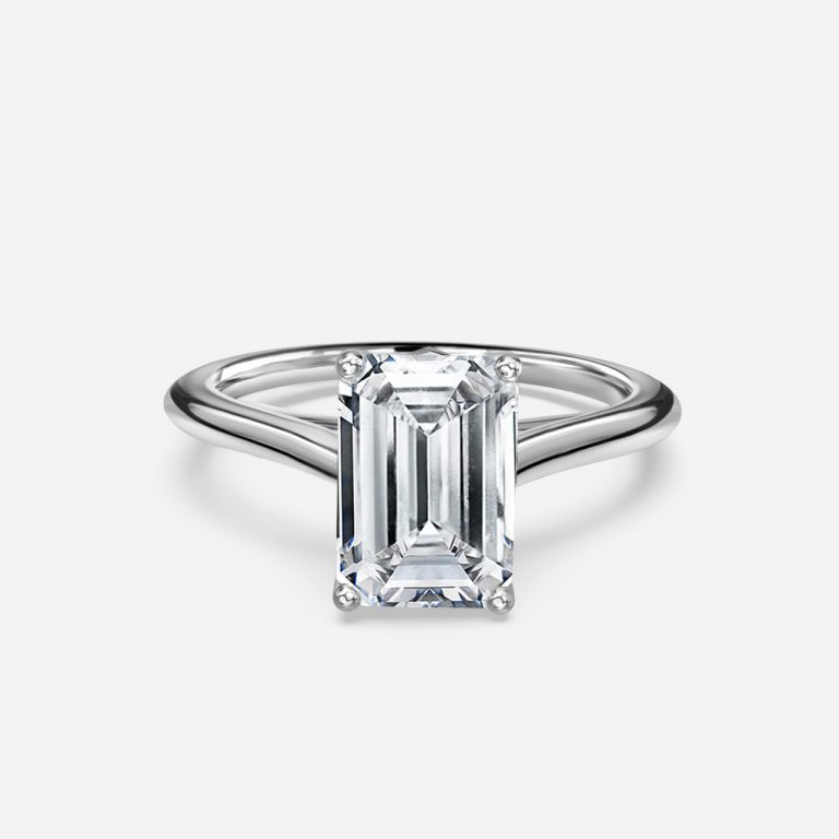 emerald solitaire engagement ring with wedding band