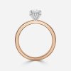 hidden halo oval engagement ring gold