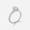 hidden halo oval engagement ring white gold