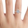 solitaire radiant ring on finger