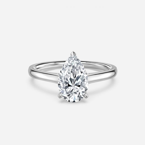 women pear cut solitaire diamond ring