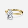 yellow gold pear engagement ring with hidden halo