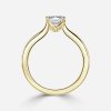asscher cut diamond yellow gold wedding ring on finger