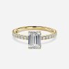 emerald cut engagement yellow gold ring with hidden halo