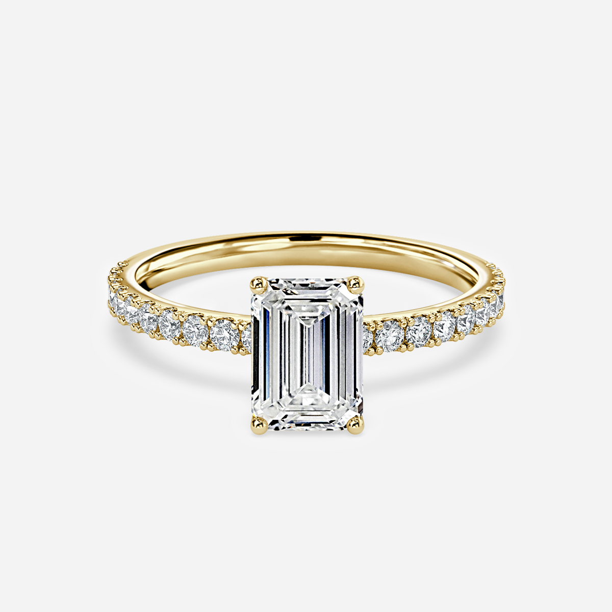emerald cut engagement yellow gold ring with hidden halo