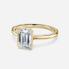 emerald cut yellow gold solitaire ring