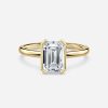 yellow gold emerald solitaire ring