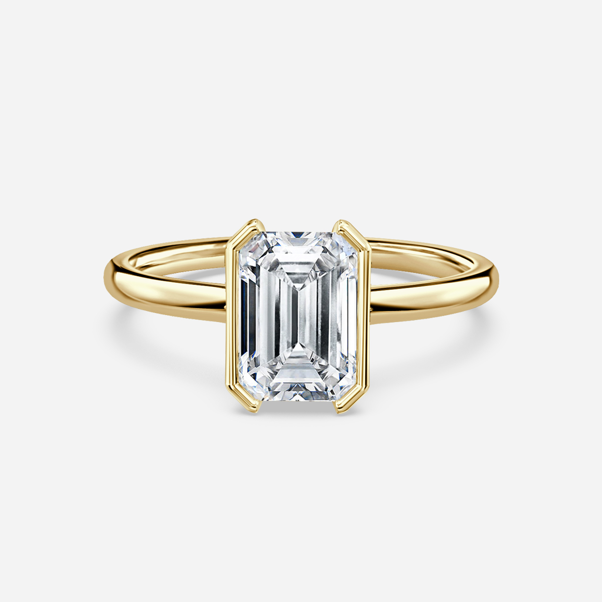 yellow gold emerald solitaire ring
