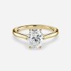 cathedral set yellow gold oval diamond ring