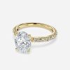 unique band oval diamond yellow gold engagement ring
