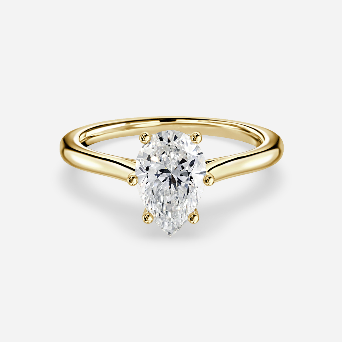 cathedral set yellow gold pear diamond ring